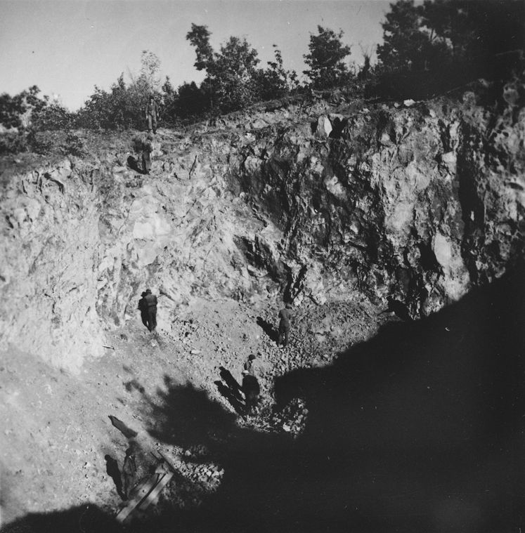 Prisoners from the Sixth Labor Battalion work at a stone quarry at a Slovakian labor camp